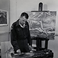 Colville working on his painting Bodies in a Grave